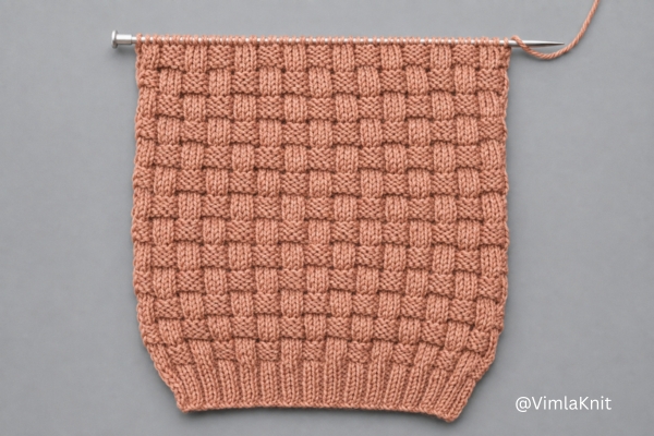 basketweave knit beanie pattern showing the main body stitch texture on the needle.